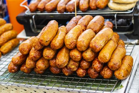 Fried sausages on a plateの写真素材
