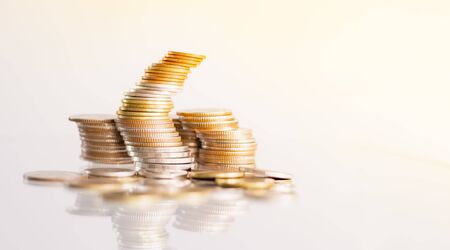 Money Coins stacked on each other in different positions.