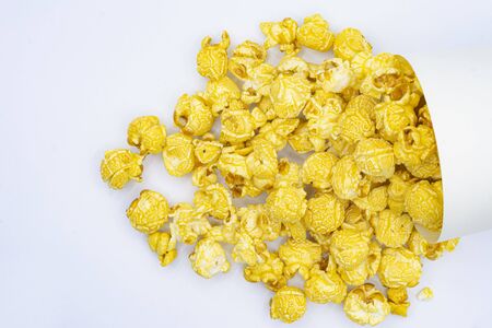 paper bucket of popcorn on white color backgroundの写真素材