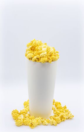 paper bucket of popcorn on white color backgroundの写真素材