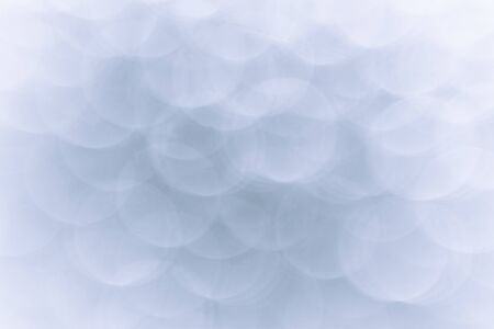 Abstract blue bokeh texture on black background