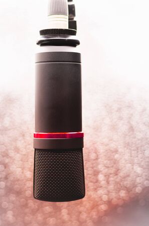 Sound studio. Microphone with cable isolated on bright  backgroundの写真素材