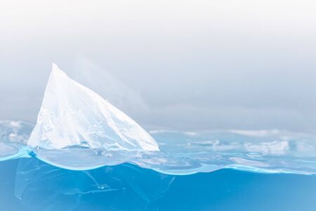 Environmental problems of plastic pollution in the beautiful blue oceanの写真素材