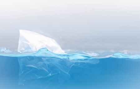 Environmental problems of plastic pollution in the beautiful blue oceanの写真素材