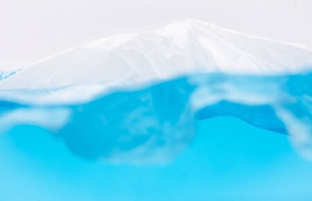 Environmental problems of plastic pollution in the beautiful blue oceanの写真素材