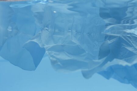 Environmental problems of plastic pollution in the beautiful blue oceanの写真素材