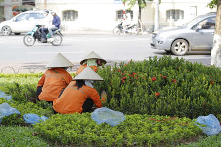 Hanoi, Vietnam - October 27, 2019: Hanoi old quarter main square, rickshaw drivers carrying tourists around town.のeditorial素材