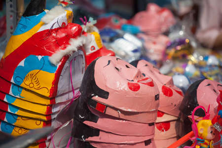 Traditional market sells colorful lanterns with different shapes, lion heads, drums... for the mid-autumn festival. The market is organized at Old Quarter, Hanoi.の写真素材