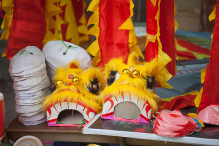 Traditional market sells colorful lanterns with different shapes, lion heads, drums... for the mid-autumn festival. The market is organized at Old Quarter, Hanoi.の写真素材