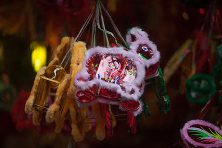 Traditional market sells colorful lanterns with different shapes, lion heads, drums... for the mid-autumn festival. The market is organized at Old Quarter, Hanoi.の写真素材