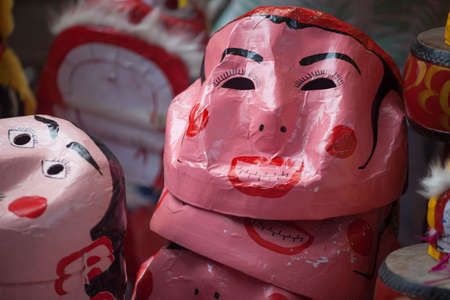 Traditional market sells colorful lanterns with different shapes, lion heads, drums... for the mid-autumn festival. The market is organized at Old Quarter, Hanoi.の写真素材