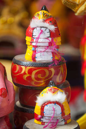 Traditional market sells colorful lanterns with different shapes, lion heads, drums... for the mid-autumn festival. The market is organized at Old Quarter, Hanoi.の写真素材