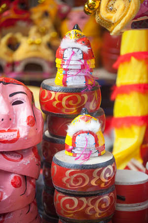 Traditional market sells colorful lanterns with different shapes, lion heads, drums... for the mid-autumn festival. The market is organized at Old Quarter, Hanoi.の写真素材