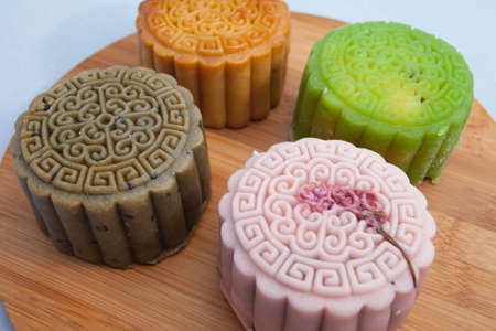 Vietnamese mid autumn festival cake. Mooncakes are traditional pastries eaten during the Mid-Autumn Festival. The festival involves family getting together to share mooncakes while watching the moonの写真素材