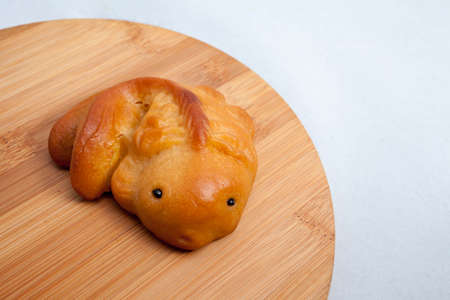 Vietnamese mid autumn festival cake. Mooncakes are traditional pastries eaten during the Mid-Autumn Festival. The festival involves family getting together to share mooncakes while watching the moonの写真素材