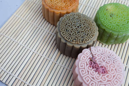 Vietnamese mid autumn festival cake. Mooncakes are traditional pastries eaten during the Mid-Autumn Festival. The festival involves family getting together to share mooncakes while watching the moonの写真素材