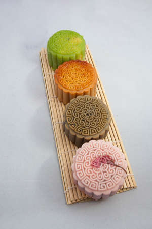 Vietnamese mid autumn festival cake. Mooncakes are traditional pastries eaten during the Mid-Autumn Festival. The festival involves family getting together to share mooncakes while watching the moonの写真素材