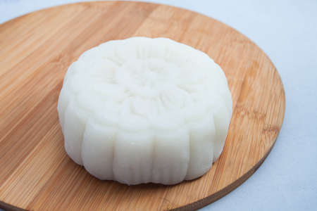 Vietnamese mid autumn festival cake. Mooncakes are traditional pastries eaten during the Mid-Autumn Festival. The festival involves family getting together to share mooncakes while watching the moonの写真素材