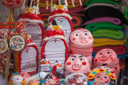 Hanoi / Vietnam - Sept. 1 2020: Traditional market sells colorful lanterns with different shapes, lion heads, drums... for the mid-autumn festival. The market is organized at Old Quarter, Hanoi.のeditorial素材
