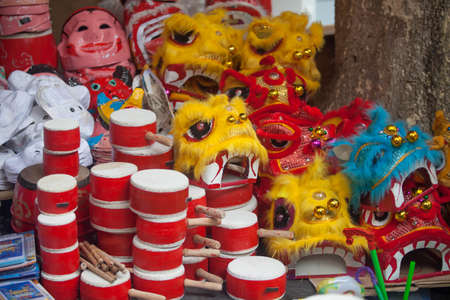 Hanoi / Vietnam - Sept. 1 2020: Traditional market sells colorful lanterns with different shapes, lion heads, drums... for the mid-autumn festival. The market is organized at Old Quarter, Hanoi.のeditorial素材