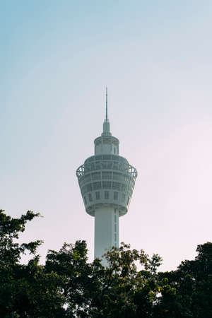 White Pak Nam observation deck from below in Samut Prakan, Thailand, with trees below.のeditorial素材