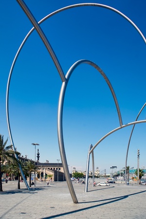 Massive metal sculpture port entrance Barcelonaの写真素材