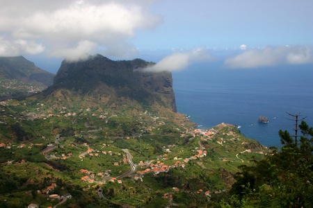 Penha d'Aguia (Eagle's rock) and Porto da Cruz Madeira from a ridge near Portellaの写真素材
