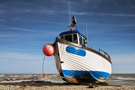 Fishing boat on Dungeness beachの写真素材