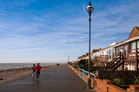 Joggers on promenade at Bexhill On Seaの写真素材