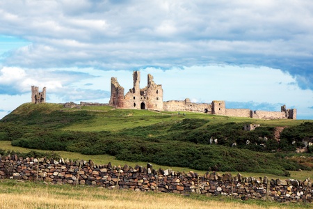View of Dunstanburgh Castle at Craster Northumberlandの写真素材