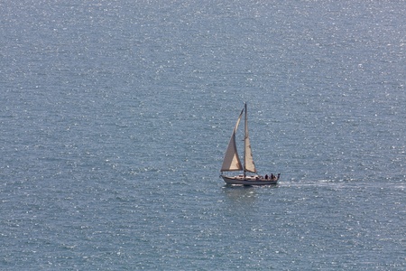 Yacht sailing close to Beachy Head coastline