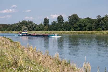 Barge cruising down the Rhine south of Strasbourg