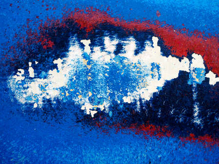 FAVERSHAM, KENT/UK - March 29 : Abstract peeling sanded paintwork on a Fibre glass boat in Faversham...