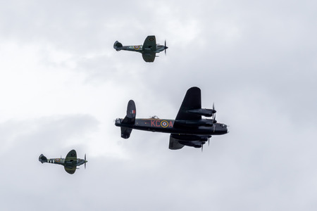 Avro Lancaster flanked by two Spitfires