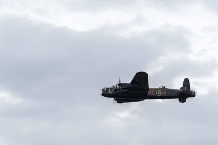 Avro Lancaster bomber flying over Shoreham Airfield
