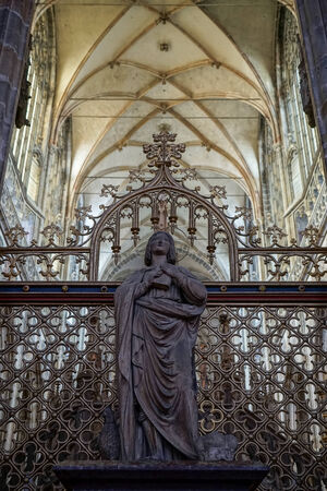 Statue of a woman holding a book in St Vitus Cathedral in Pragueのeditorial素材