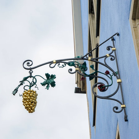Golden grapes hanging sign in Rothenburgの写真素材