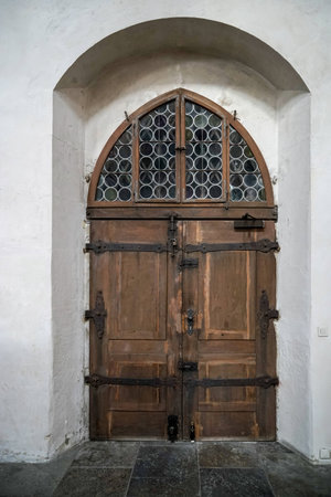 Old wooden door in St James Church in Rothenburgの写真素材