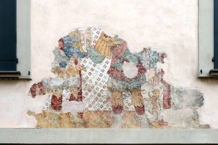 Old faded mural on a wall in Sarnico