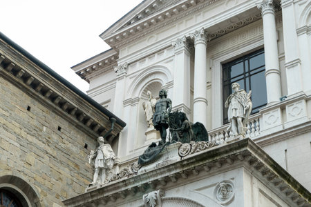 Statues on an old neo-classical building in Citta Alta Bergamoの写真素材