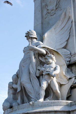 Statue of a an Angel with Children at the Victoria Memorial outside Buckingham Palace in Londonのeditorial素材