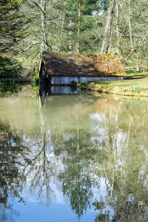 View of the boathouse on the Scotney Castle Estateのeditorial素材