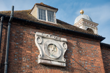 Old sundial on a building in Rye East Sussexのeditorial素材