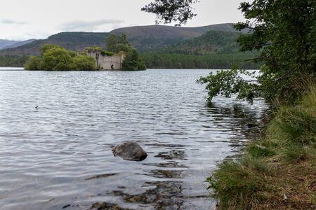 Castle in the middle of Loch an Eilein near Aviemore Scotlandのeditorial素材