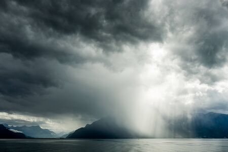 Storm passing over Lake Geneva in Switzerlandの写真素材