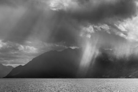 Storm passing over Lake Geneva in Switzerlandの写真素材