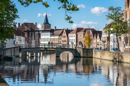 View along a canal in Bruges West Flanders in Belgiumのeditorial素材