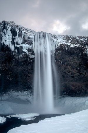 View of Seljalandfoss Waterfall in Winterの写真素材