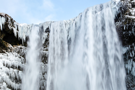 View of Skogafoss Waterfall in Winterの写真素材