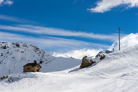 View of a Chapel in the Dolomites at the Pordoi Passの写真素材